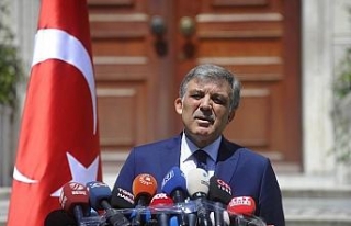 "Başlarını iki elleri arasına alıp ..."