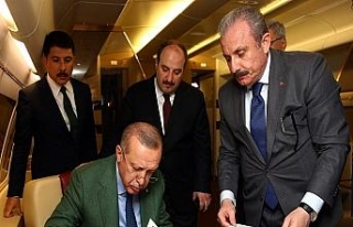 Cumhur İttifakı protokolünü uçakta imzaladı