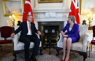 İngiltere Başbakanı May ile bir araya geldi