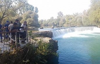 Oğlunu kurtarmak isterken ırmakta kayboldu